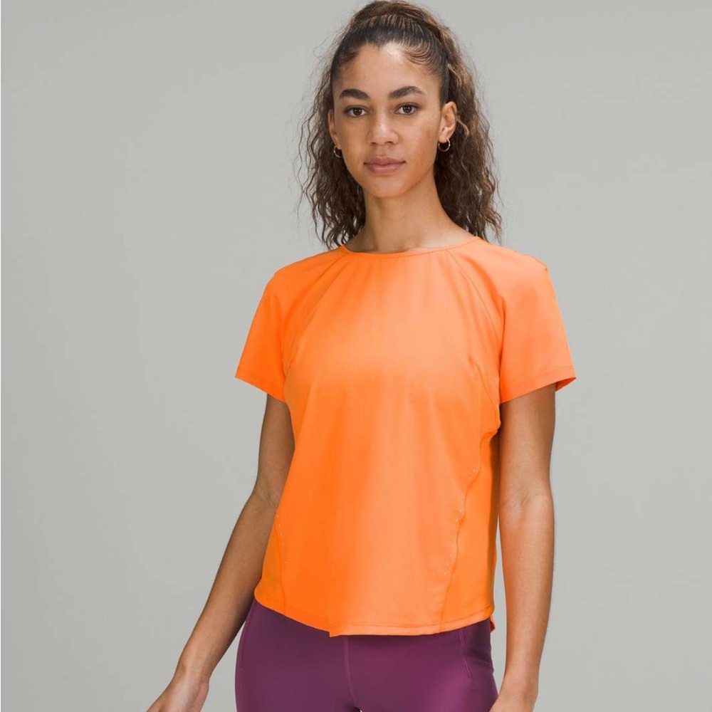 Lululemon Lightweight Stretch Run Short Sleeve Shirt
Orange Soda size 2